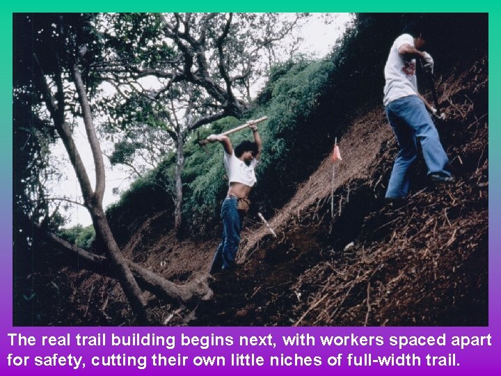 The real trail building begins next, with workers spaced apart for safety, cutting their