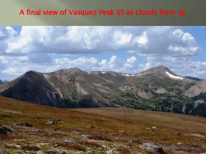 A final view of Vasquez Peak (r) as clouds form up 