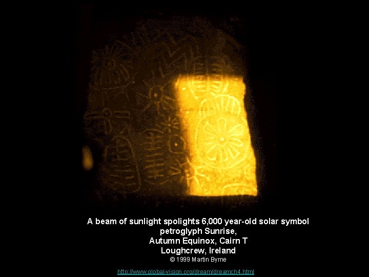 A beam of sunlight spolights 6, 000 year-old solar symbol petroglyph Sunrise, Autumn Equinox,