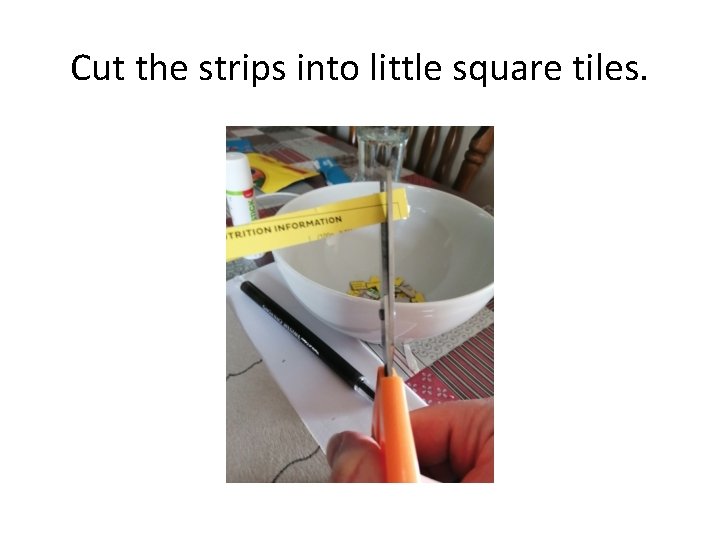 Cut the strips into little square tiles. 