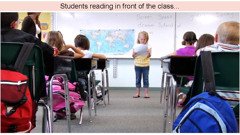 Students reading in front of the class. . . 