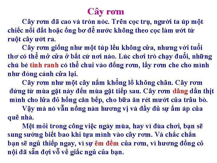 Cây rơm đã cao và tròn nóc. Trên cọc trụ, người ta úp một