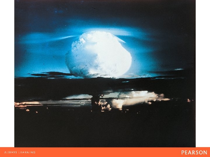 The explosion of a U. S. test bomb over an uninhabited island in the