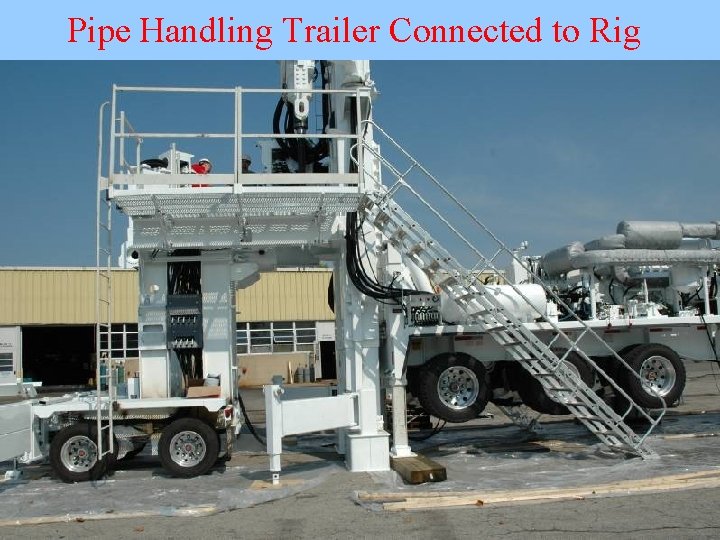 Pipe Handling Trailer Connected to Rig 